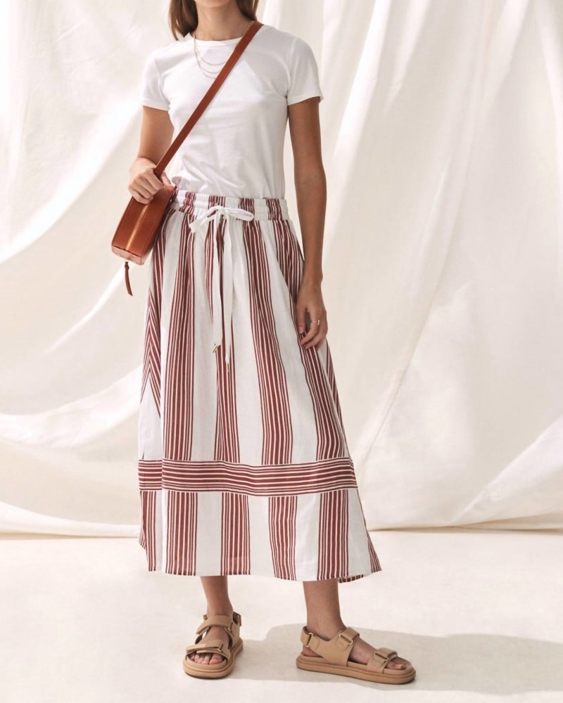 Front of a model wearing a size L Isotta Skirt in Mala Stripe in Mala Stripe by Sancia. | dia_product_style_image_id:339487